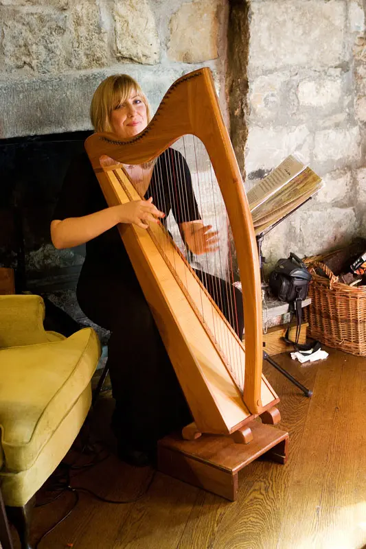 Lucia McGinnis with her harp